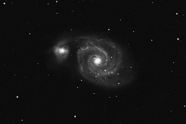 M51 -- The Whirlpool Galaxy (Processing 2)
M51 -- The Whirlpool Galaxy in Canes Vanetici, processed in CCDSoft, CCDStack, and Photoshop using GradientXterminator.  I reprocessed the image with better skills and tools and got a nicer result.  Still not enough data, but better.

