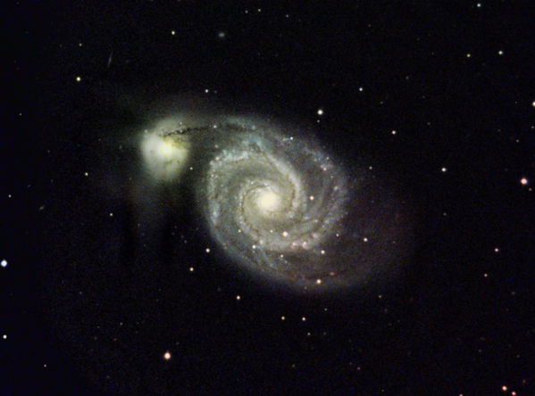M51 -- The Whirlpool Galaxy
M51 -- The Whirlpool Galaxy in Canes Venatici, Maxim DL, CCDStack, Photoshop, Gradient Exterminator.  Finally a close to acceptable processing of these data.  The gradients were awful so the color is a bit strained, and I may have clipped the black level a little bit too.
