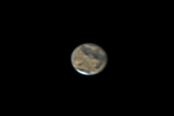 Mars, December 31, 2007
Mars on New Year's Eve 2007.  Stacked and sharpened in Registax using gaussian wavelets, sharpened and touched up in PixInsight, final work in Photoshop.  This was the first shot of the night and the seeing deteriorated from there.  

