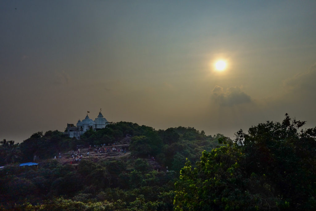 The Sun setting behind Khandagiri temple