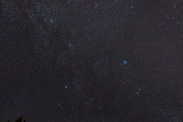 Pleiades and the Double Cluster
The Pleiades and the Double Cluster with Capella in the lower left.  Captured in my RX100 M4, processed in PixInsight and Lightroom.
